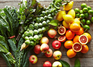 a group of fruits and vegetables on a wood surface Healthy Weight Loss Diets Teddington
